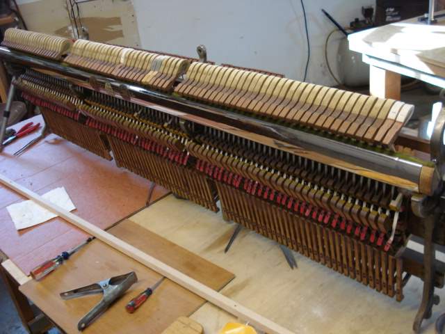 13 - Action ready for re-installation in piano